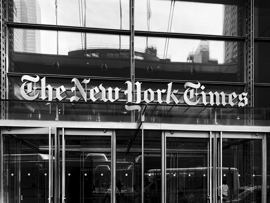 Grayscale image of The New York Times building entrance in New York City. — Best Antivirus Designed for Android